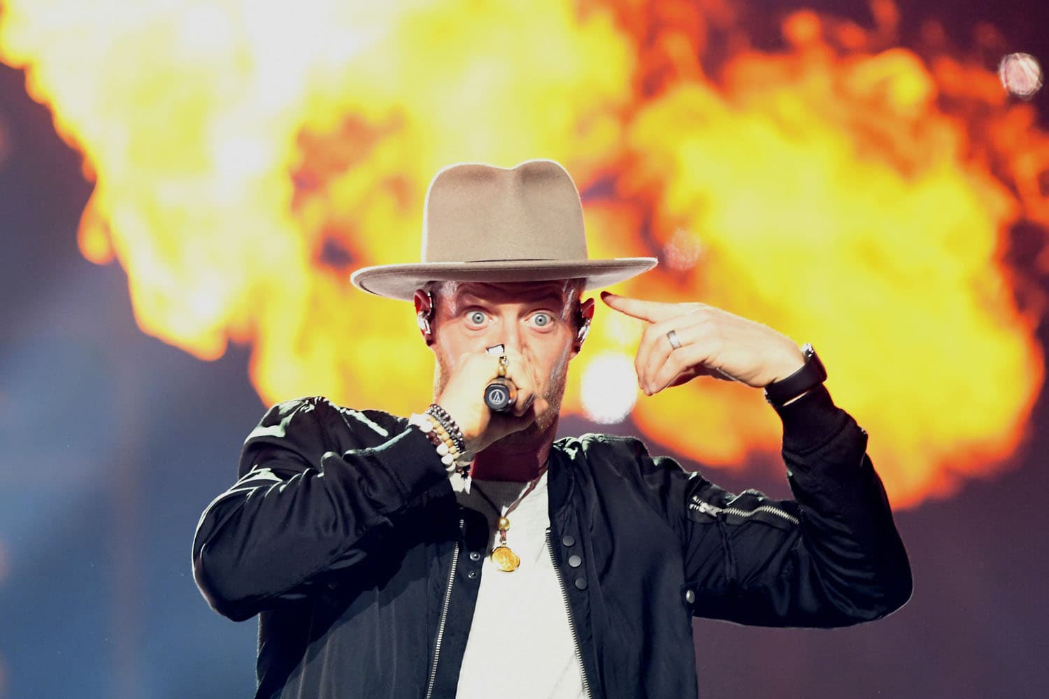 Professional country music concert photography of Tyler Hubbard from Florida Georgia Line performing on stage. Country music festival performance with high-energy crowd interaction expertly captured.