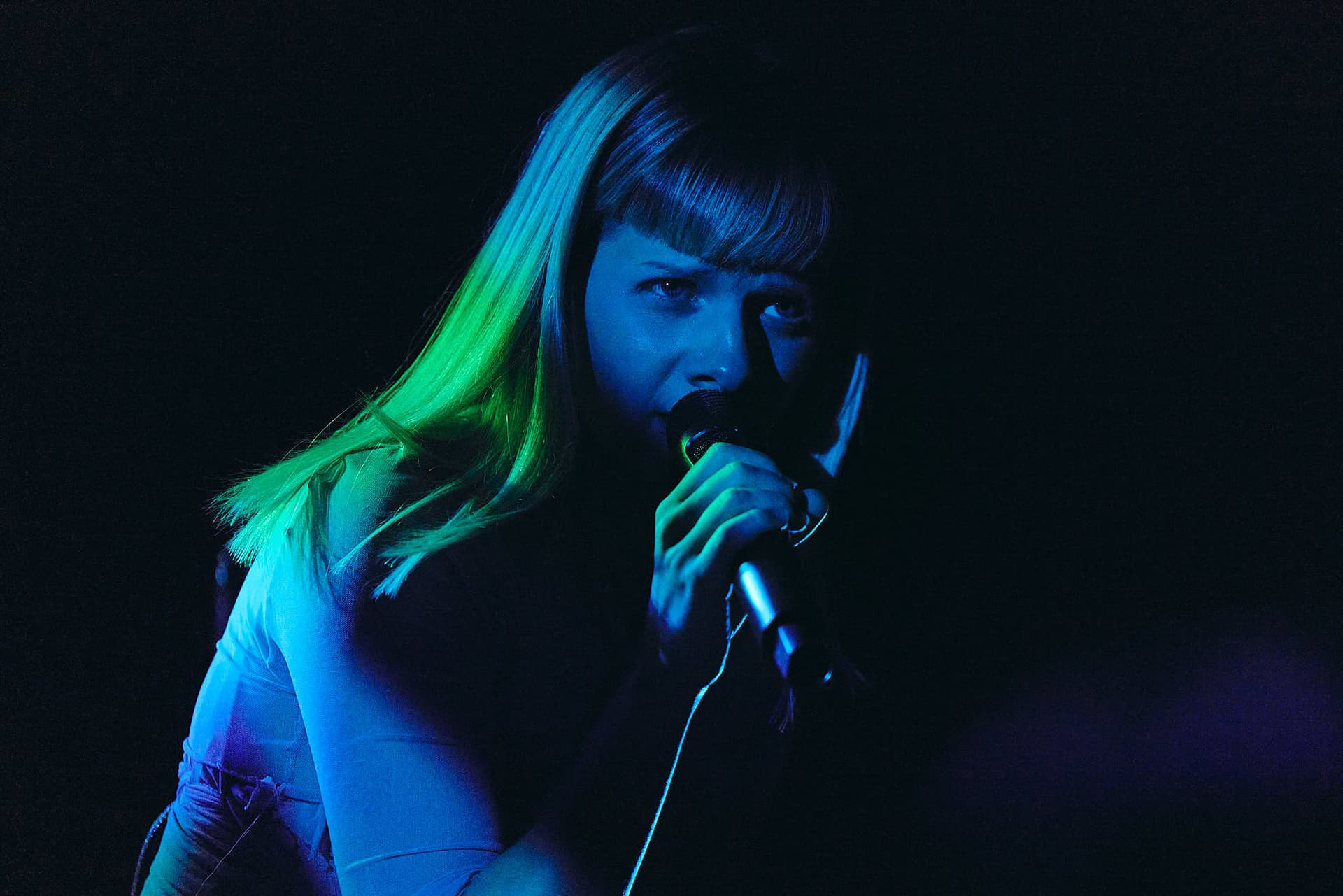 Festival concert photography of Icelandic artist Aurora performing at Bumbershoot Arts and Music Festival. Artistic music festival performance captured with expertise in alternative artist staging and lighting.